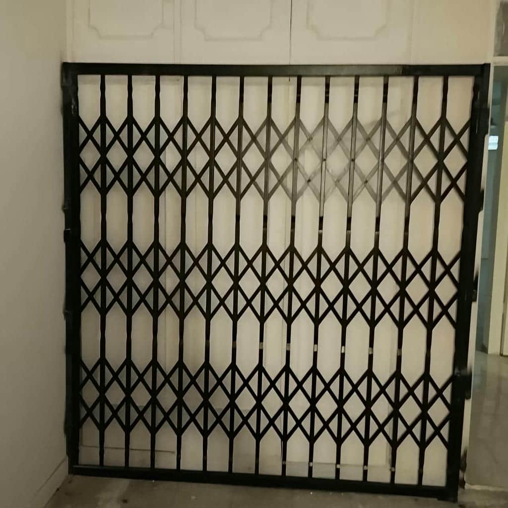 قیمت درب آکاردئونی فلزی روی درب ضدسرقت در اندیشه