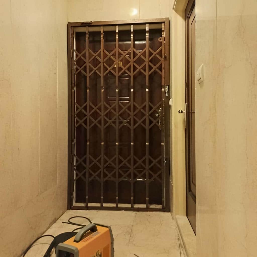 نصب درب آکاردئونی فلزی چهارگل در گنبدکاووس