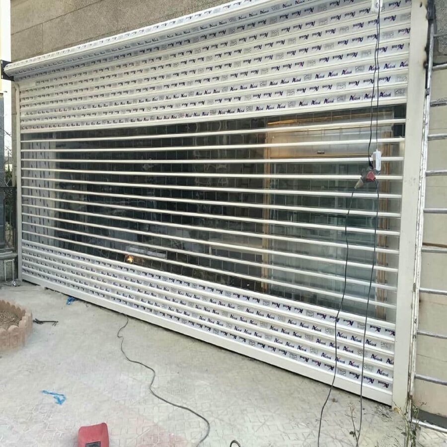 کرکره برقی پارکینگ خودرو ساختمان با فتوسل ایمنی مسیر